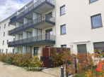Stilvolle moderne 2-Zi.-Neubauwohnung mit Balkon, Tiefgaragenstellplatz & Fahrstuhl – barrierefrei - Hausansicht