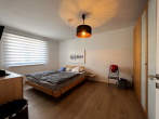 Schlafzimmer - Neuwertige 2-Zimmer-Wohnung mit Balkon, TG- Stellplatz & Aufzug in Barsinghausen