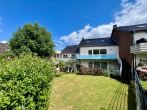 Garten - Wohnen & Vermieten unter einem Dach – Zweifamilienhaus mit 2 Eigentumswohnungen und Garagen
